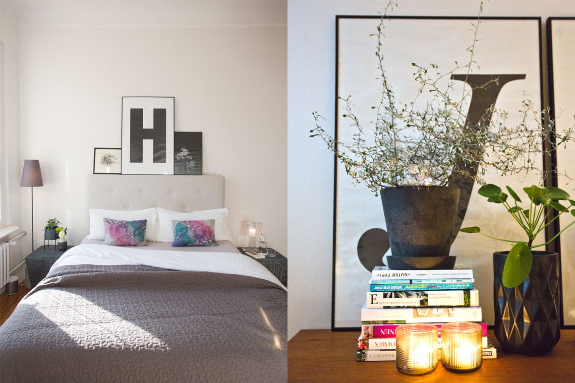 Inneneinrichtung: Bett, Kissen, Bilder, Pflanzen, Kerzen, Bücher